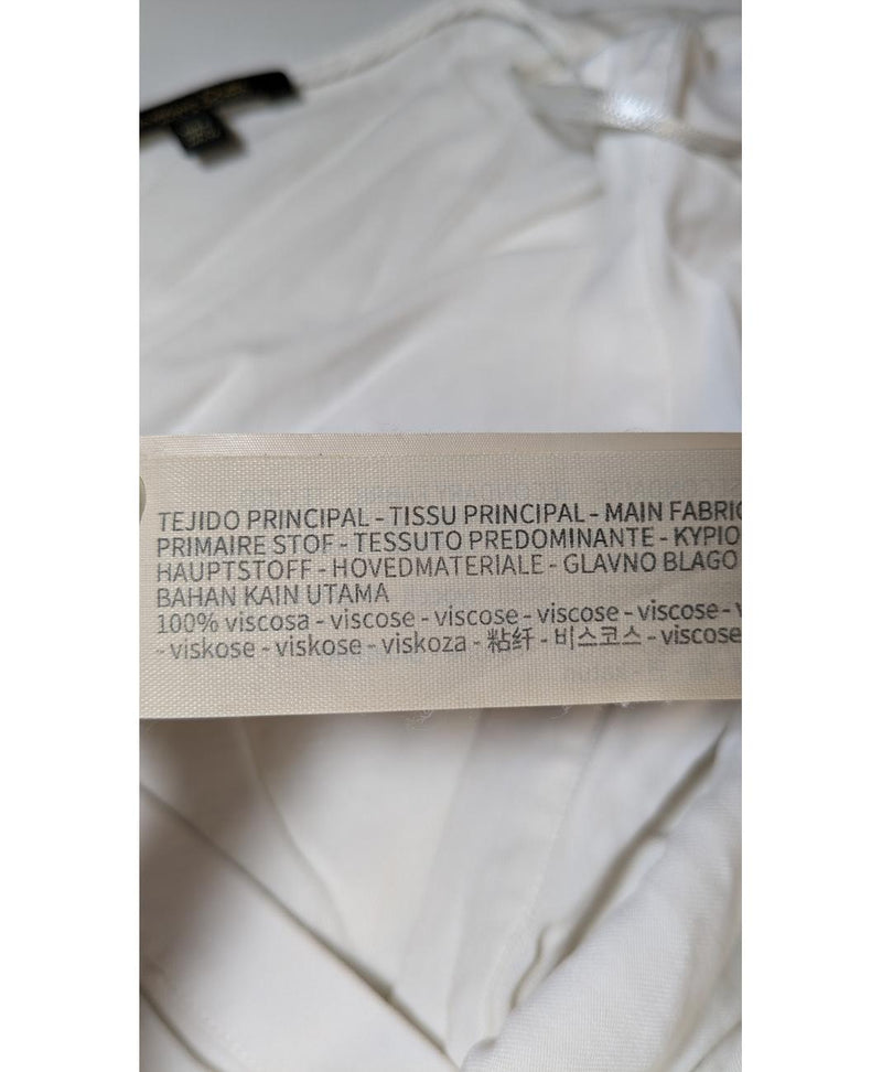 Élégance responsable avec cette pièce vintage 563392 en parfait état, sélectionnée par Once Again.