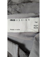La garantie Once Again : 563408 vêtements d'occasion de marque en état irréprochable.