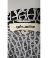 La garantie Once Again : 563425 vêtements d'occasion de marque en état irréprochable.