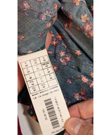 La garantie Once Again : 563552 vêtements d'occasion de marque en état irréprochable.