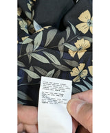 La garantie Once Again : 563563 vêtements d'occasion de marque en état irréprochable.