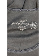 La garantie Once Again : 563564 vêtements d'occasion de marque en état irréprochable.