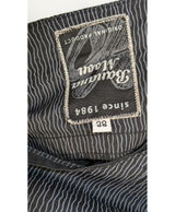 La garantie Once Again : 563575 vêtements d'occasion de marque en état irréprochable.