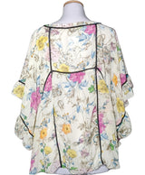 La garantie Once Again : 563592 vêtements d'occasion de marque en état irréprochable.