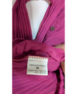 La garantie Once Again : 563618 vêtements d'occasion de marque en état irréprochable.