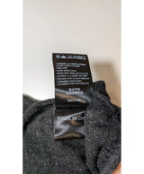 La garantie Once Again : 563638 vêtements d'occasion de marque en état irréprochable.