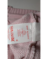 La garantie Once Again : 563721 vêtements d'occasion de marque en état irréprochable.