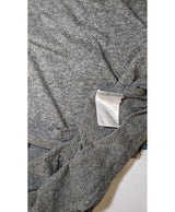La garantie Once Again : 563810 vêtements d'occasion de marque en état irréprochable.