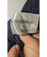 La garantie Once Again : 563837 vêtements d'occasion de marque en état irréprochable.