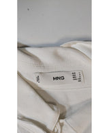 La garantie Once Again : 563894 vêtements d'occasion de marque en état irréprochable.