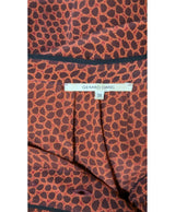 La garantie Once Again : 563933 vêtements d'occasion de marque en état irréprochable.