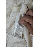 La garantie Once Again : 563980 vêtements d'occasion de marque en état irréprochable.