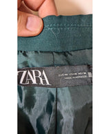 La garantie Once Again : 564228 vêtements d'occasion de marque en état irréprochable.