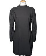 La garantie Once Again : 564332 vêtements d'occasion de marque en état irréprochable.
