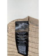 La garantie Once Again : 564400 vêtements d'occasion de marque en état irréprochable.