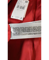 La garantie Once Again : 564490 vêtements d'occasion de marque en état irréprochable.