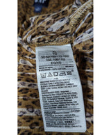 La garantie Once Again : 564499 vêtements d'occasion de marque en état irréprochable.