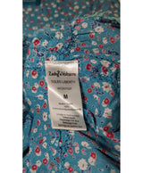 La garantie Once Again : 564510 vêtements d'occasion de marque en état irréprochable.