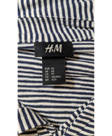La garantie Once Again : 564567 vêtements d'occasion de marque en état irréprochable.
