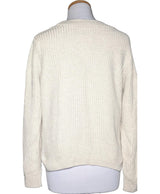 La garantie Once Again : 564607 vêtements d'occasion de marque en état irréprochable.