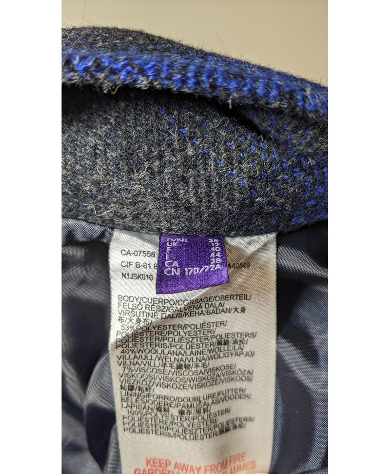 La garantie Once Again : 564645 vêtements d'occasion de marque en état irréprochable.