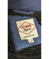 La garantie Once Again : 564890 vêtements d'occasion de marque en état irréprochable.