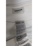 La garantie Once Again : 564945 vêtements d'occasion de marque en état irréprochable.