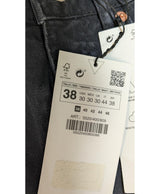 La garantie Once Again : 564952 vêtements d'occasion de marque en état irréprochable.