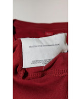 La garantie Once Again : 564984 vêtements d'occasion de marque en état irréprochable.