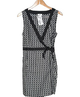 La garantie Once Again : 565069 vêtements d'occasion de marque en état irréprochable.