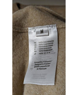 La garantie Once Again : 565173 vêtements d'occasion de marque en état irréprochable.