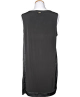 La garantie Once Again : 565199 vêtements d'occasion de marque en état irréprochable.