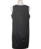 La garantie Once Again : 565516 vêtements d'occasion de marque en état irréprochable.