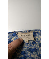 La garantie Once Again : 565583 vêtements d'occasion de marque en état irréprochable.