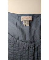 La garantie Once Again : 565615 vêtements d'occasion de marque en état irréprochable.
