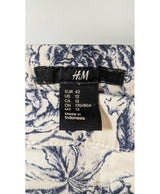 La garantie Once Again : 565647 vêtements d'occasion de marque en état irréprochable.