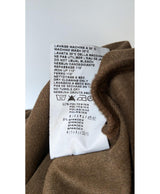 La garantie Once Again : 565723 vêtements d'occasion de marque en état irréprochable.