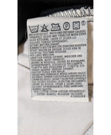 La garantie Once Again : 565752 vêtements d'occasion de marque en état irréprochable.