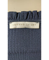 La garantie Once Again : 565843 vêtements d'occasion de marque en état irréprochable.