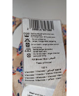 La garantie Once Again : 565868 vêtements d'occasion de marque en état irréprochable.