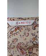 La garantie Once Again : 565870 vêtements d'occasion de marque en état irréprochable.