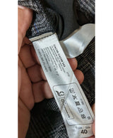 La garantie Once Again : 566223 vêtements d'occasion de marque en état irréprochable.