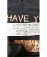 La garantie Once Again : 566335 vêtements d'occasion de marque en état irréprochable.