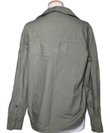 La garantie Once Again : 566416 vêtements d'occasion de marque en état irréprochable.