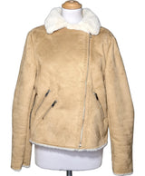 La garantie Once Again : 566949 vêtements d'occasion de marque en état irréprochable.