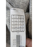 La garantie Once Again : 566953 vêtements d'occasion de marque en état irréprochable.