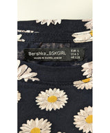 La garantie Once Again : 566975 vêtements d'occasion de marque en état irréprochable.