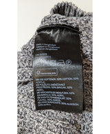 La garantie Once Again : 567051 vêtements d'occasion de marque en état irréprochable.