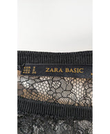 La garantie Once Again : 567062 vêtements d'occasion de marque en état irréprochable.
