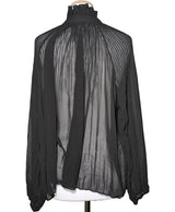 La garantie Once Again : 567123 vêtements d'occasion de marque en état irréprochable.